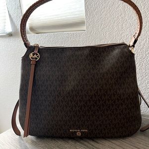 Michael Kors original design. Looks almost new.